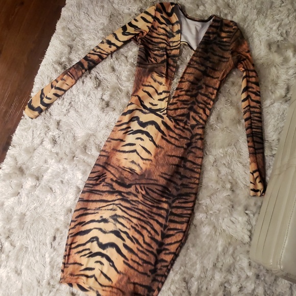 The Dollhouse factory Dresses & Skirts - The DollHouse Factory Leopard Dress (size small)